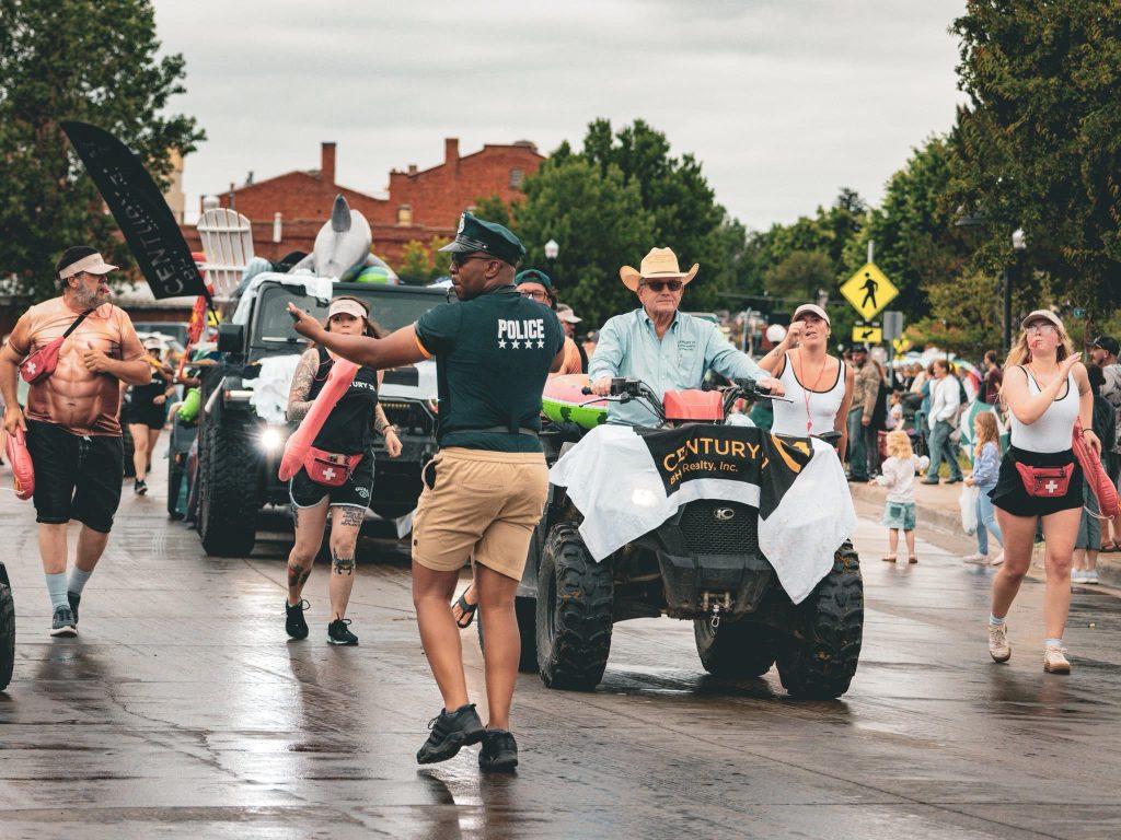 Century 21 BHJ walking in the parade 