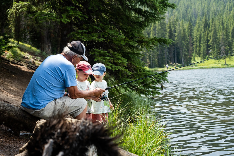 A family fishing in the Big Horn mountains
